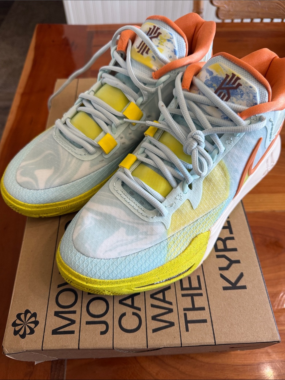 Nike Light Blue, Yellow & Orange Kyrie Basketball Sneakers